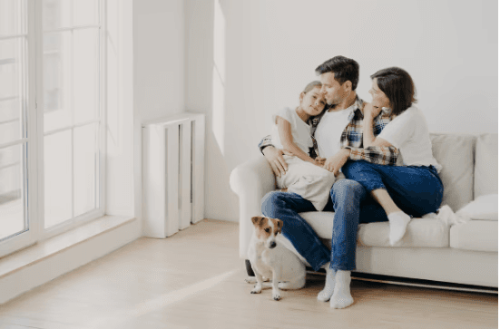 Family relaxing on sofa