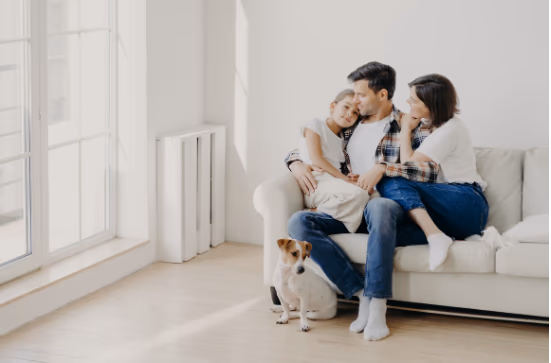 Family relaxing on sofa